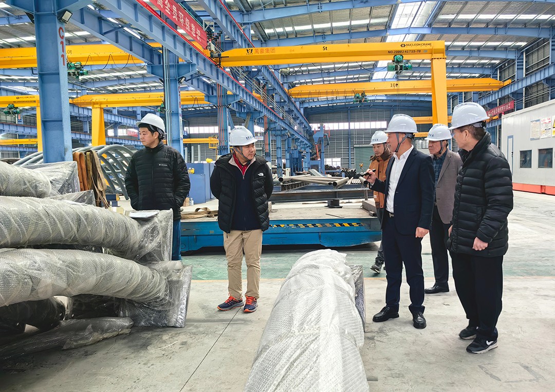 中國鋼結(jié)構(gòu)協(xié)會空間結(jié)構(gòu)分會領(lǐng)導專家一行蒞臨萬豪考察指導工作